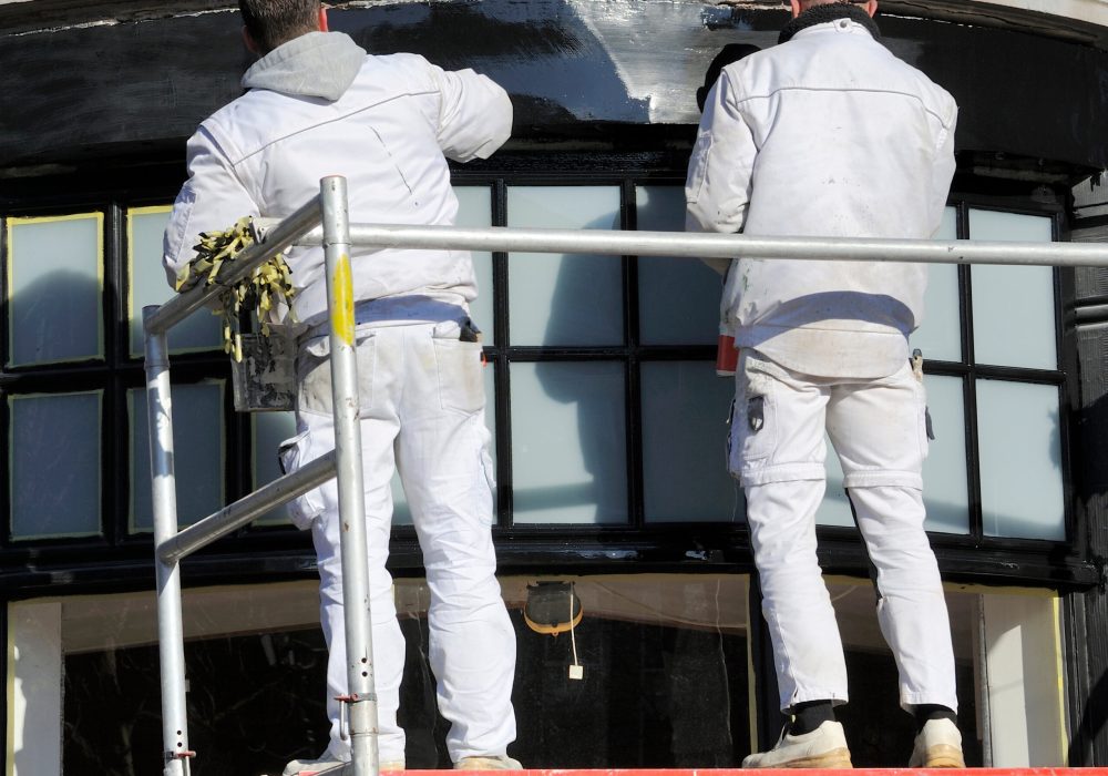 Amsterdam,,Holland-february,5:two,Painters,Working,Outside,At,A,Scaffold.february,5,